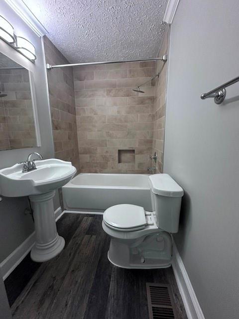 1261 Concord Road Southeast Smyrna, GA 30080 - Photo 46 of 50 a white toilet sitting next to a bathroom sink