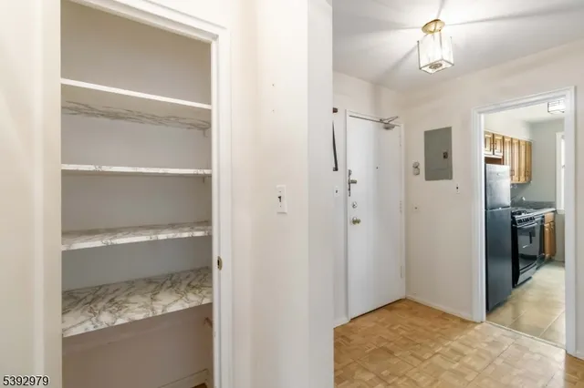 a bathroom with a shower and a bath tub