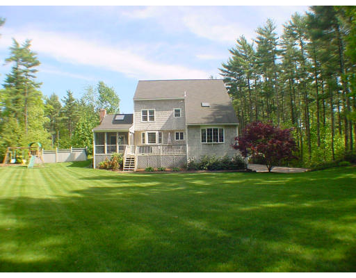 16 Newcombs Mill Road Kingston, MA 02364 - Photo 6 of 6 a front view of a house with a garden