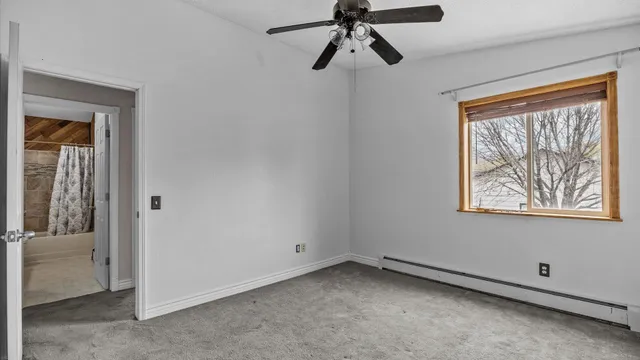 a view of a window in an empty room