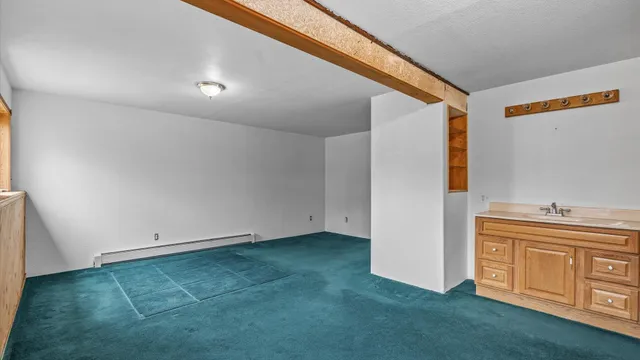a view of a kitchen with utility area