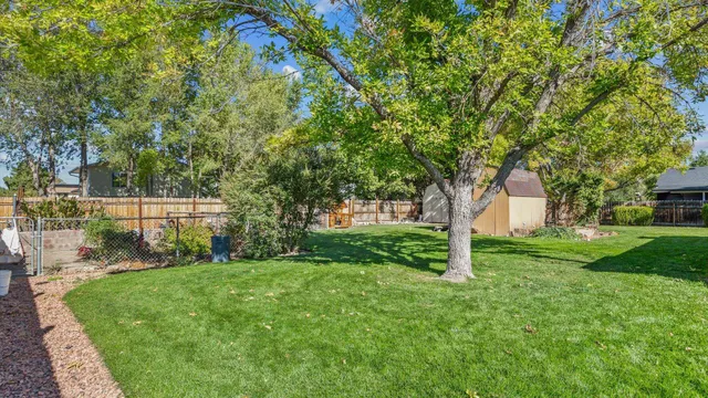 a view of a house with a snow in the yard