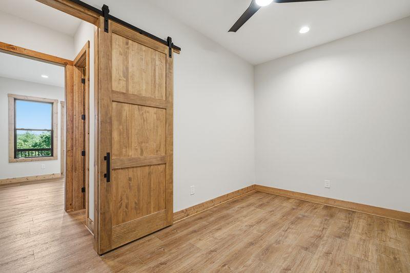 216 Old Orchard Road Ellijay, GA 30536 - Photo 46 of 59 a view of empty room with wooden floor and entryway