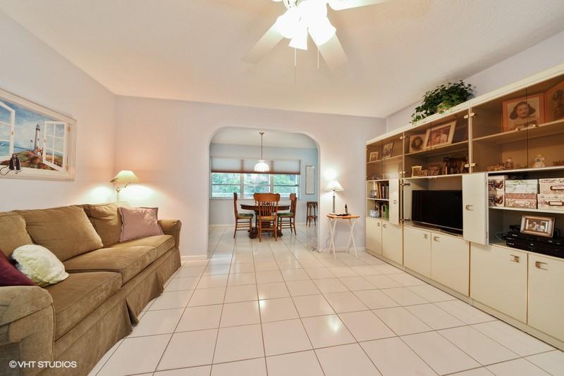 438 Dover Road Tequesta, FL 33469 - Photo 2 of 10 a living room with furniture and white walls