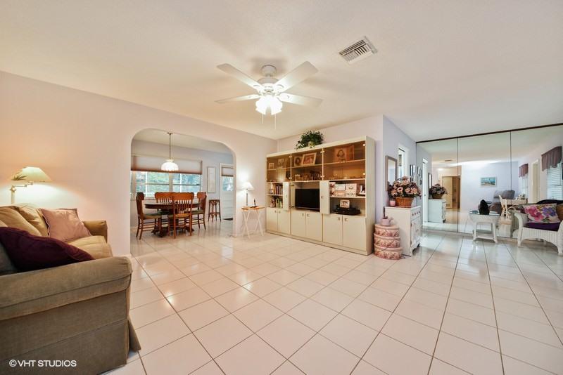 438 Dover Road Tequesta, FL 33469 - Photo 5 of 10 a living room with furniture and a flat screen tv