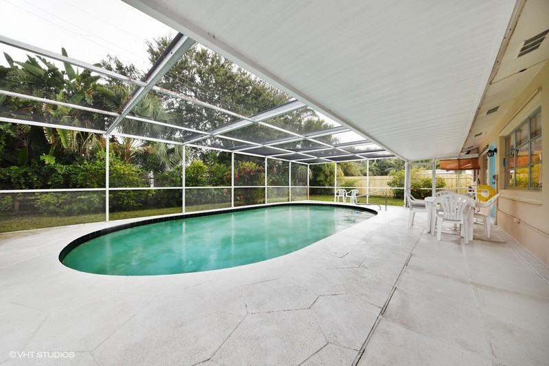 438 Dover Road Tequesta, FL 33469 - Photo 10 of 10 a view of a swimming pool with a patio
