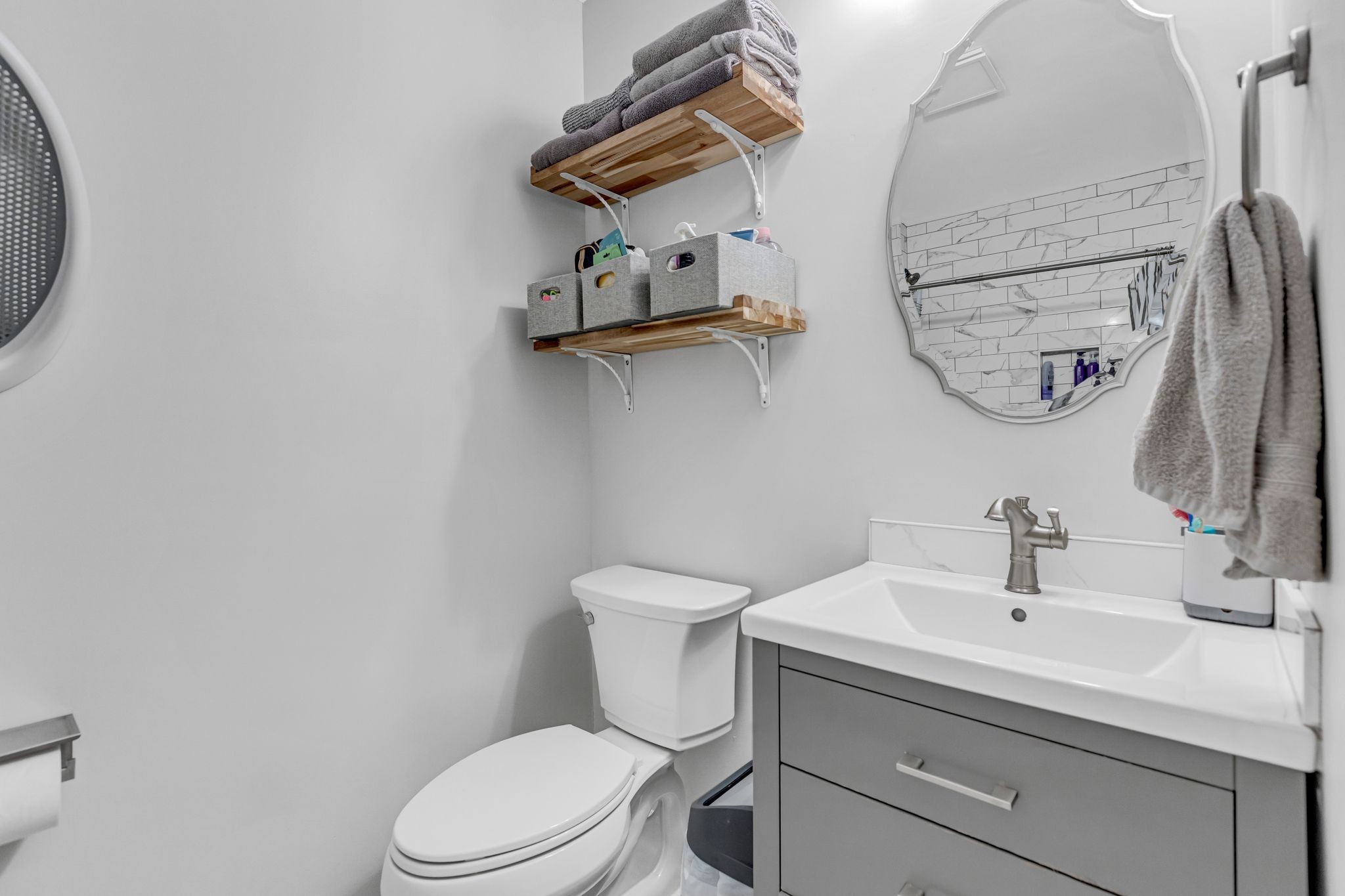 2808 Windy Way Thompson's Station, TN 37179 - Photo 21 of 39 a bathroom with a toilet sink and mirror