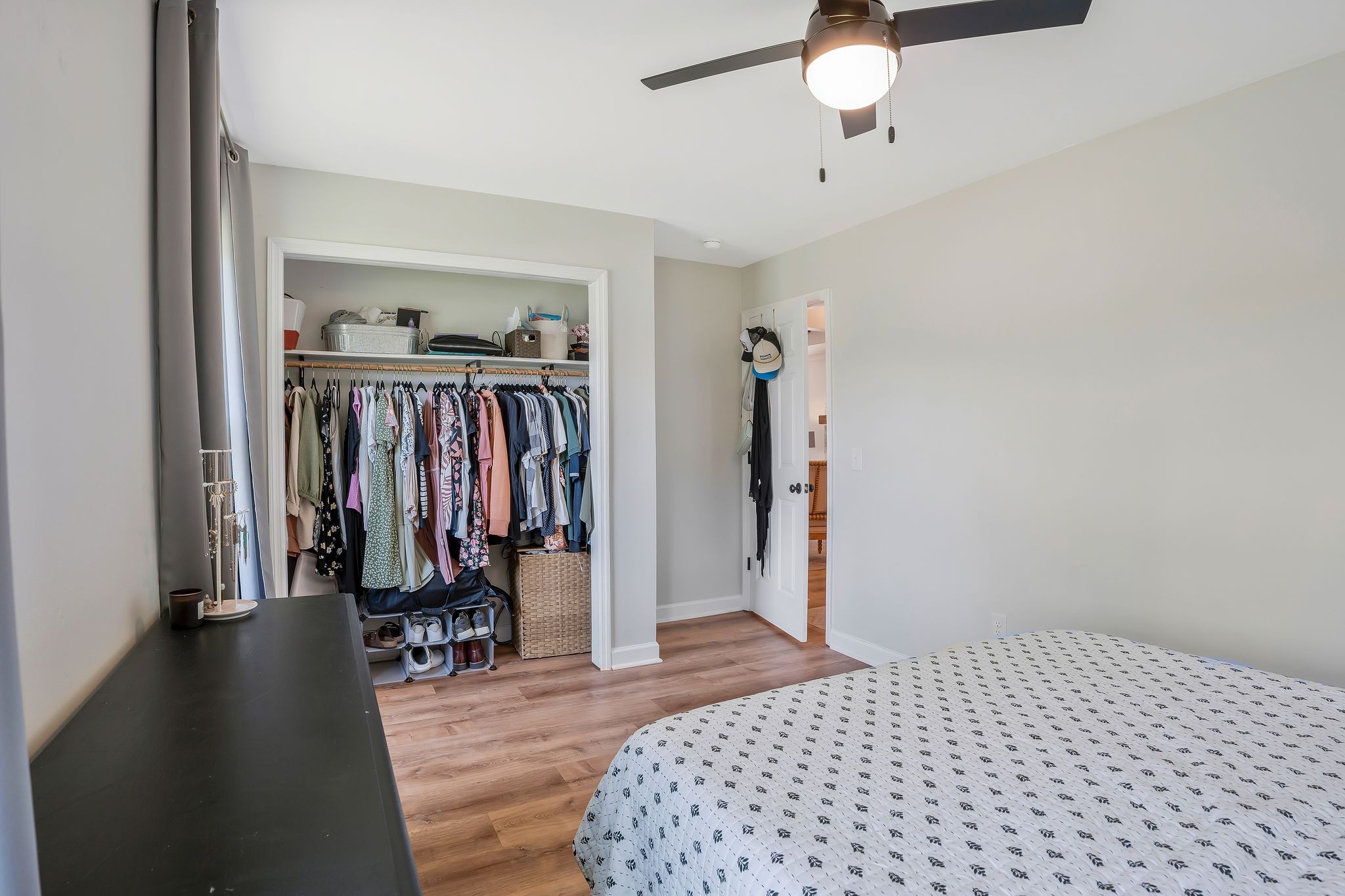 2808 Windy Way Thompson's Station, TN 37179 - Photo 25 of 39 a bedroom with a bed and a chandelier