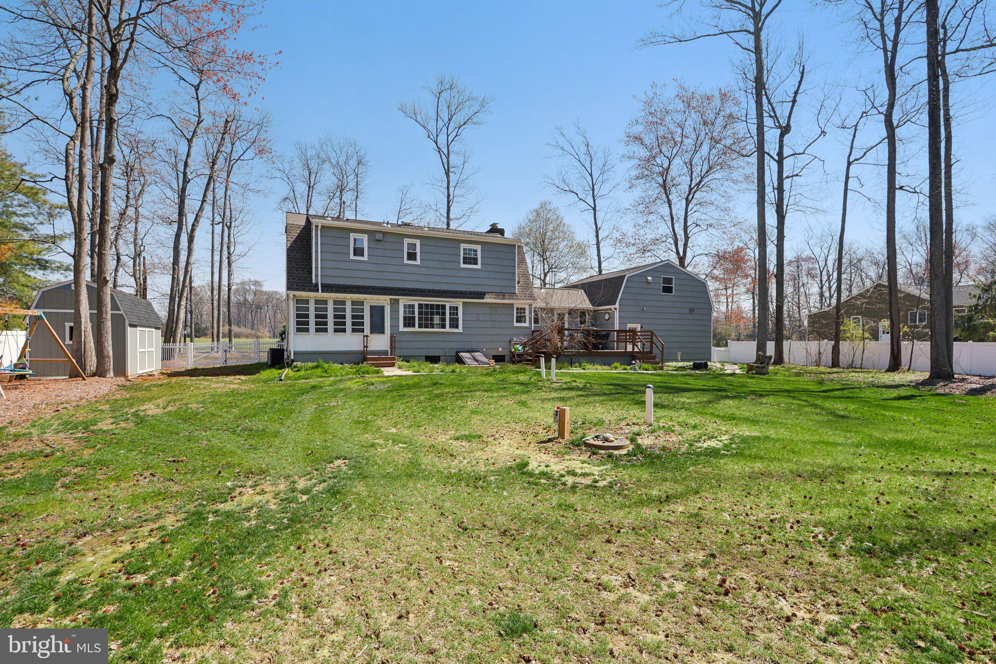 351 Merrick Road Robbinsville, NJ 08691 - Photo 53 of 69 a view of a house with a big yard and large trees