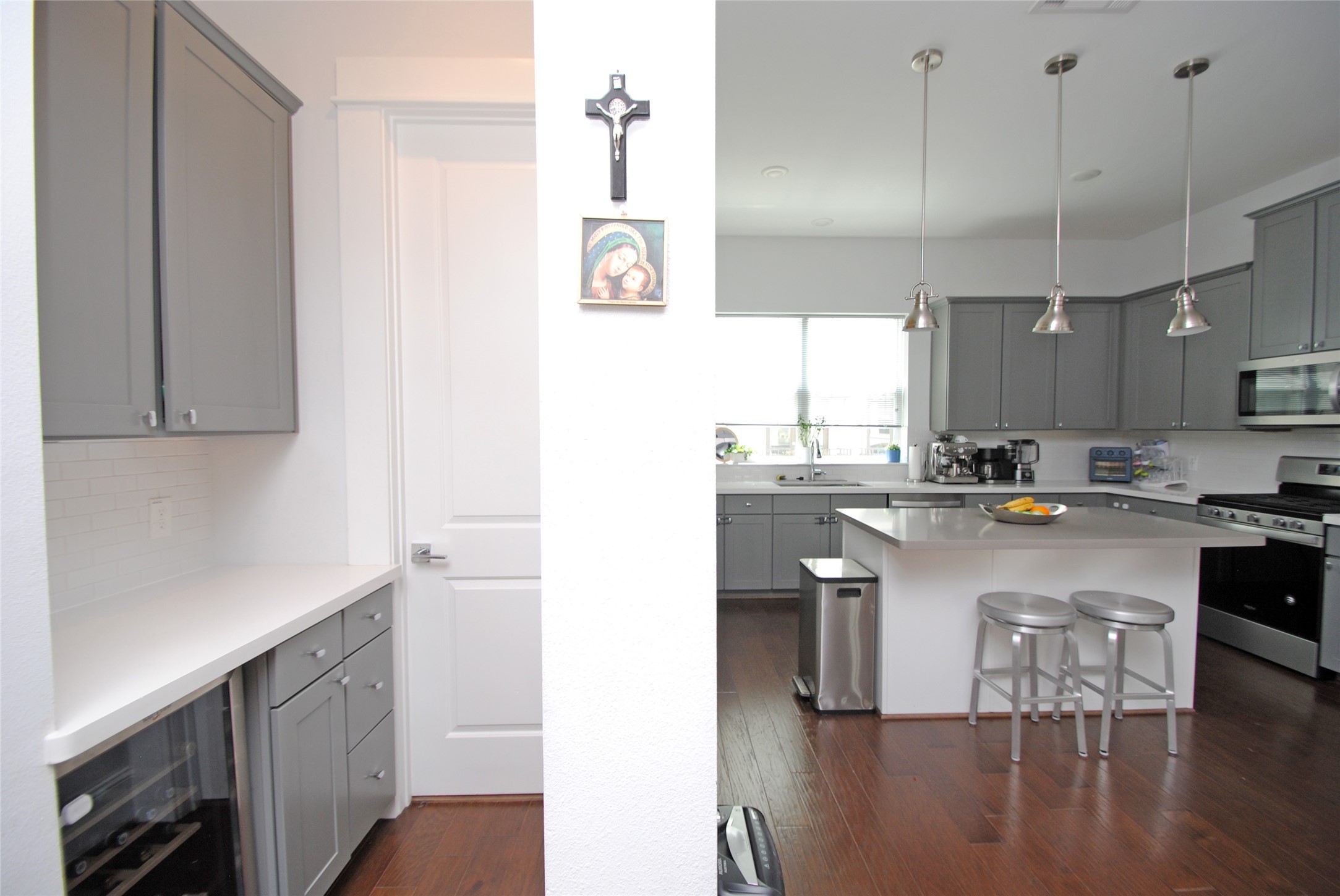 1262 North Post Oak Road, Unit B Houston, TX 77055 - Photo 11 of 44 a kitchen with a sink cabinets and window
