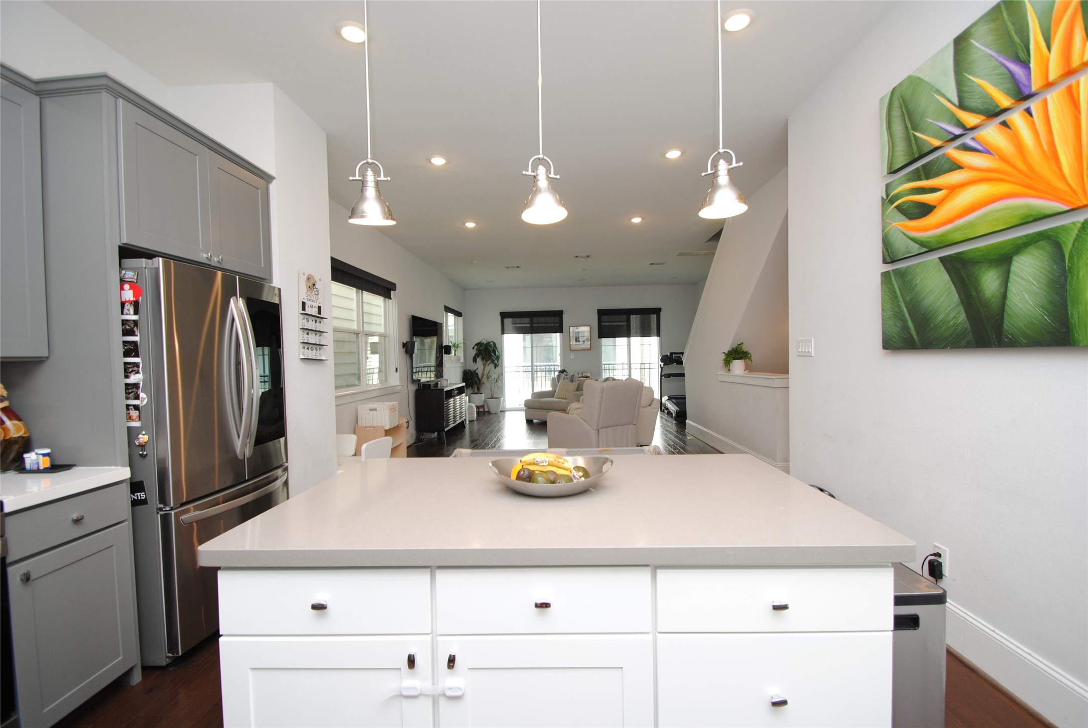 1262 North Post Oak Road, Unit B Houston, TX 77055 - Photo 21 of 44 a kitchen with stainless steel appliances kitchen island a refrigerator and a stove