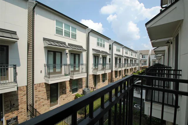 a view of a large building with a window