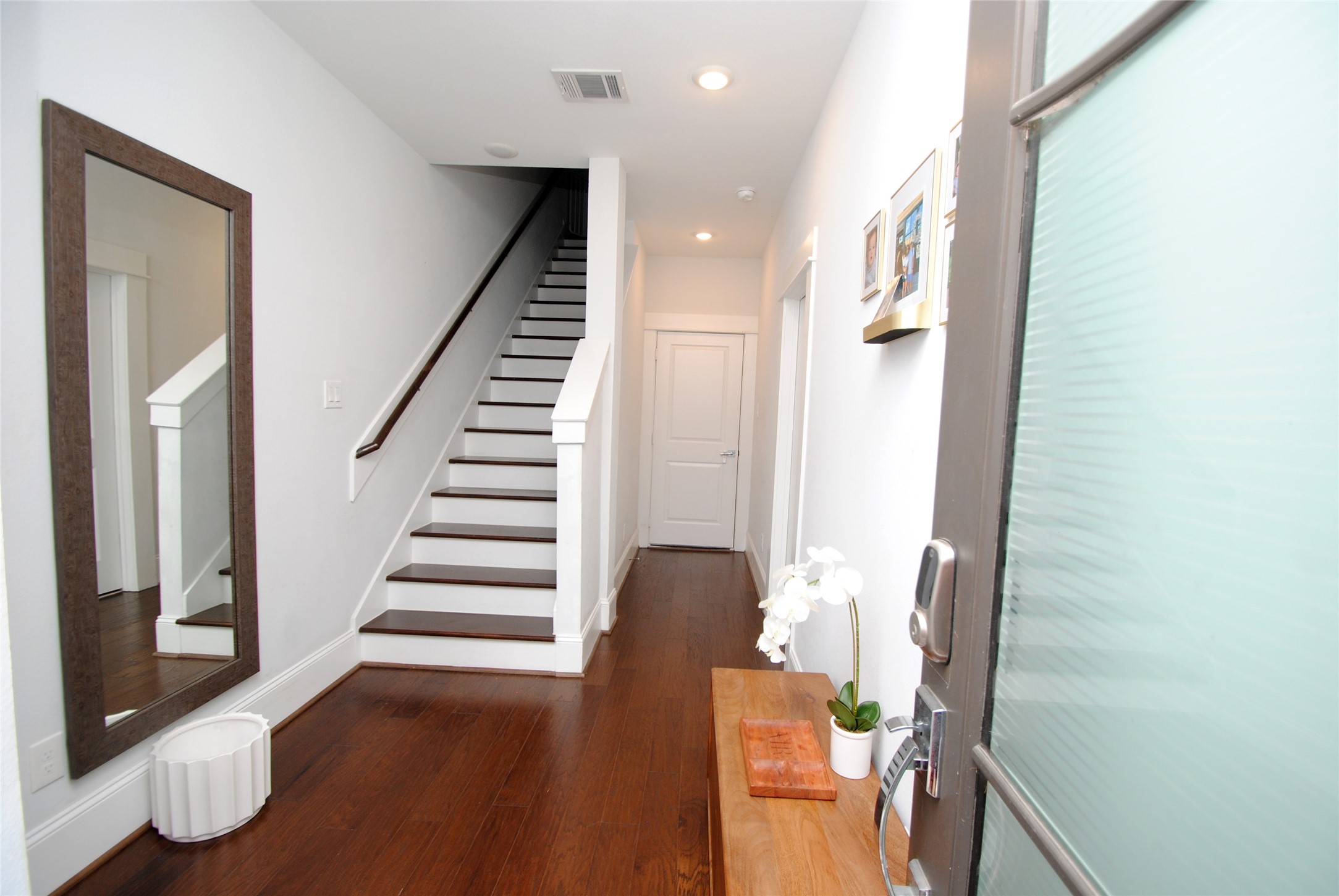 1262 North Post Oak Road, Unit B Houston, TX 77055 - Photo 3 of 44 a view of entryway with wooden floor
