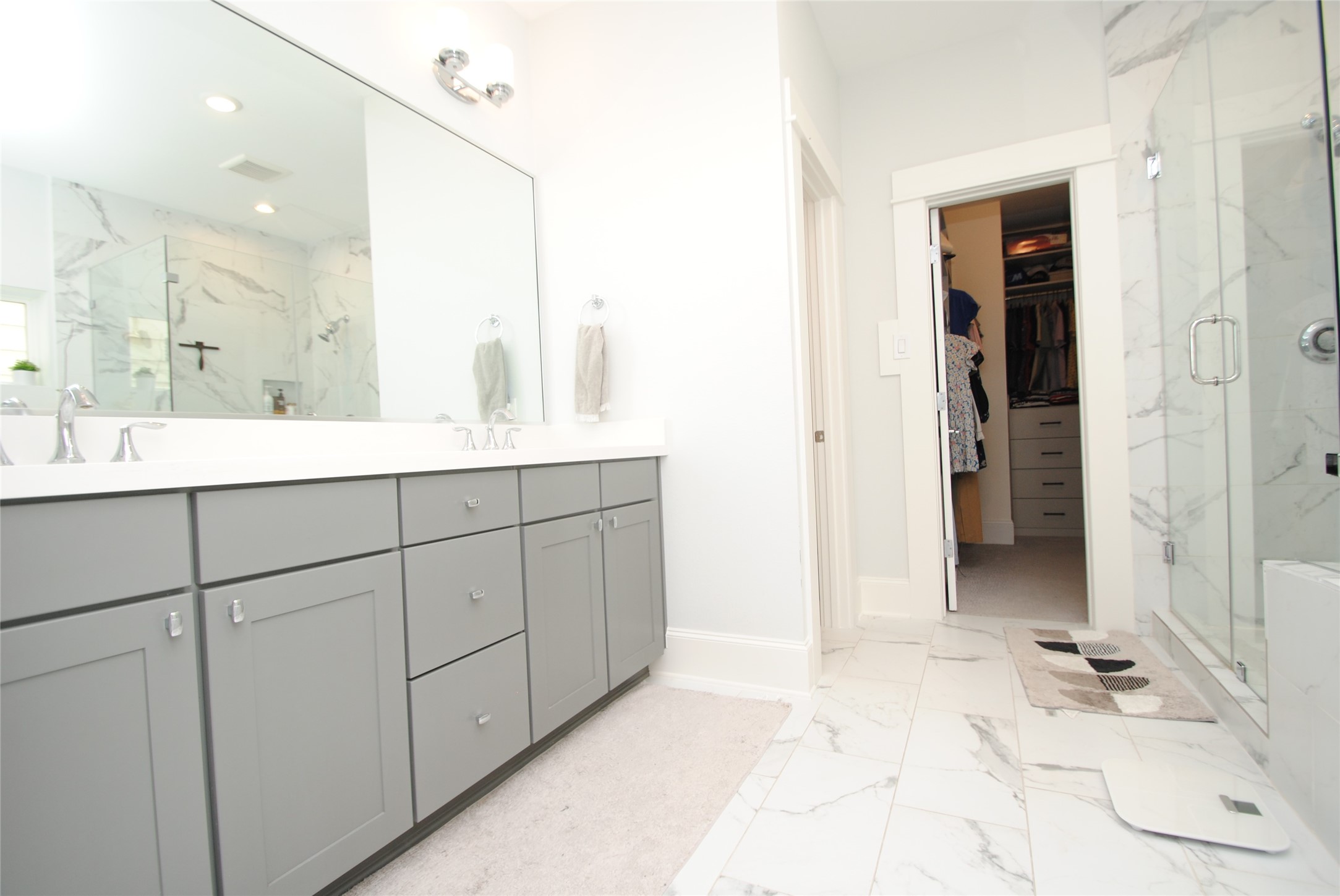 1262 North Post Oak Road, Unit B Houston, TX 77055 - Photo 32 of 44 a bathroom with a sink and mirror