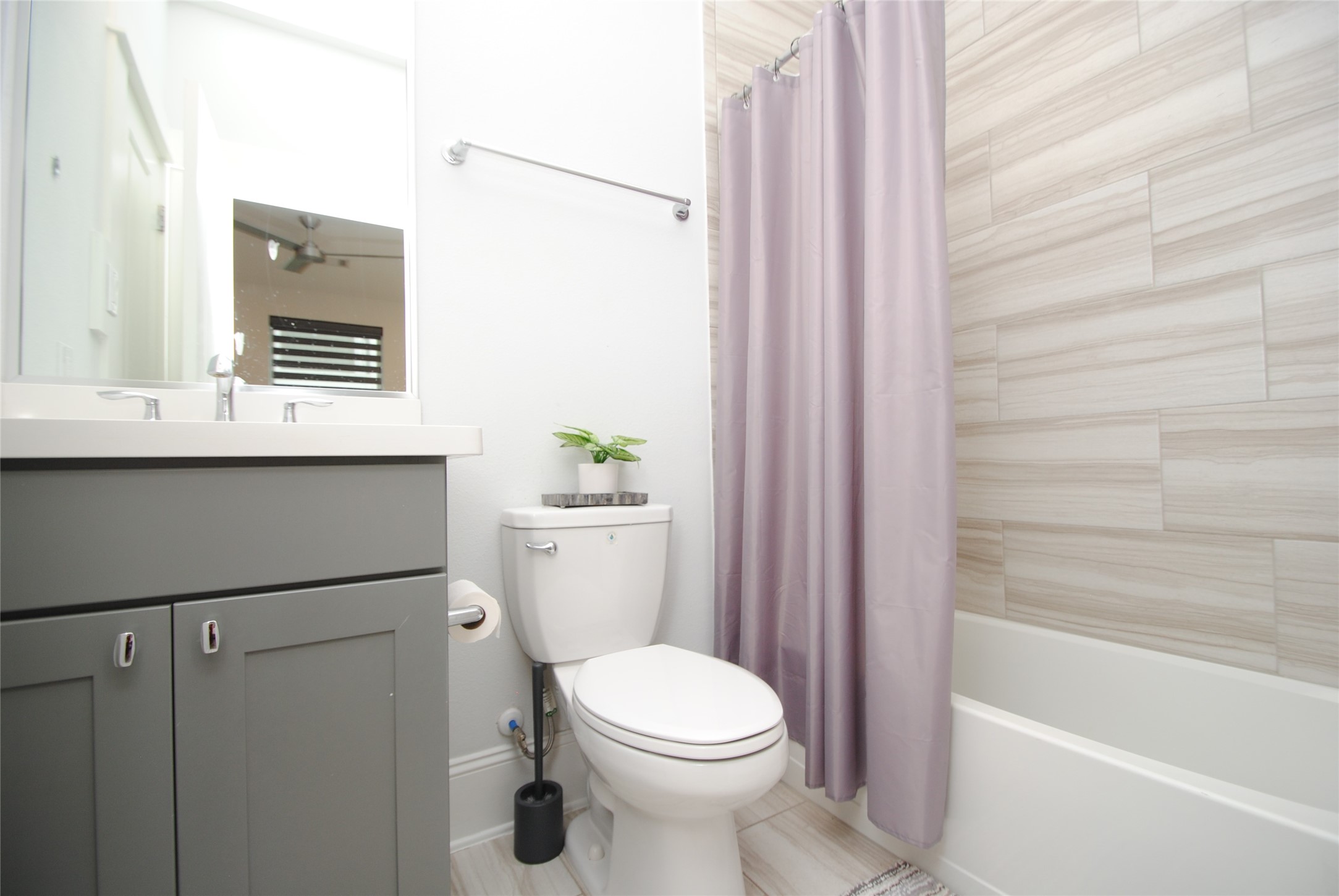 1262 North Post Oak Road, Unit B Houston, TX 77055 - Photo 5 of 44 a bathroom with a sink a toilet and shower