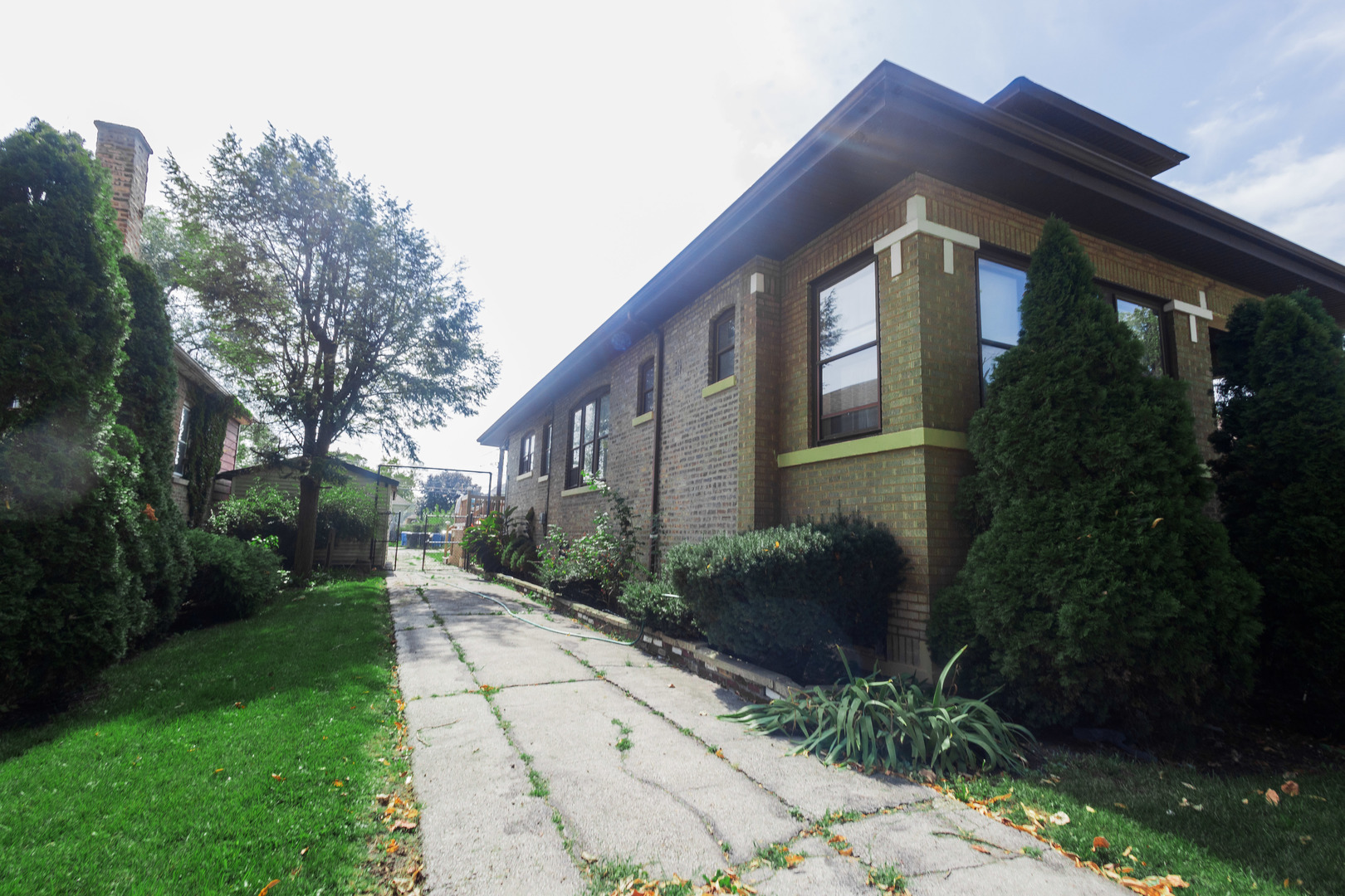 1219 West 96th Street Chicago, IL 60643 - Photo 3 of 13 a front view of a house with garden