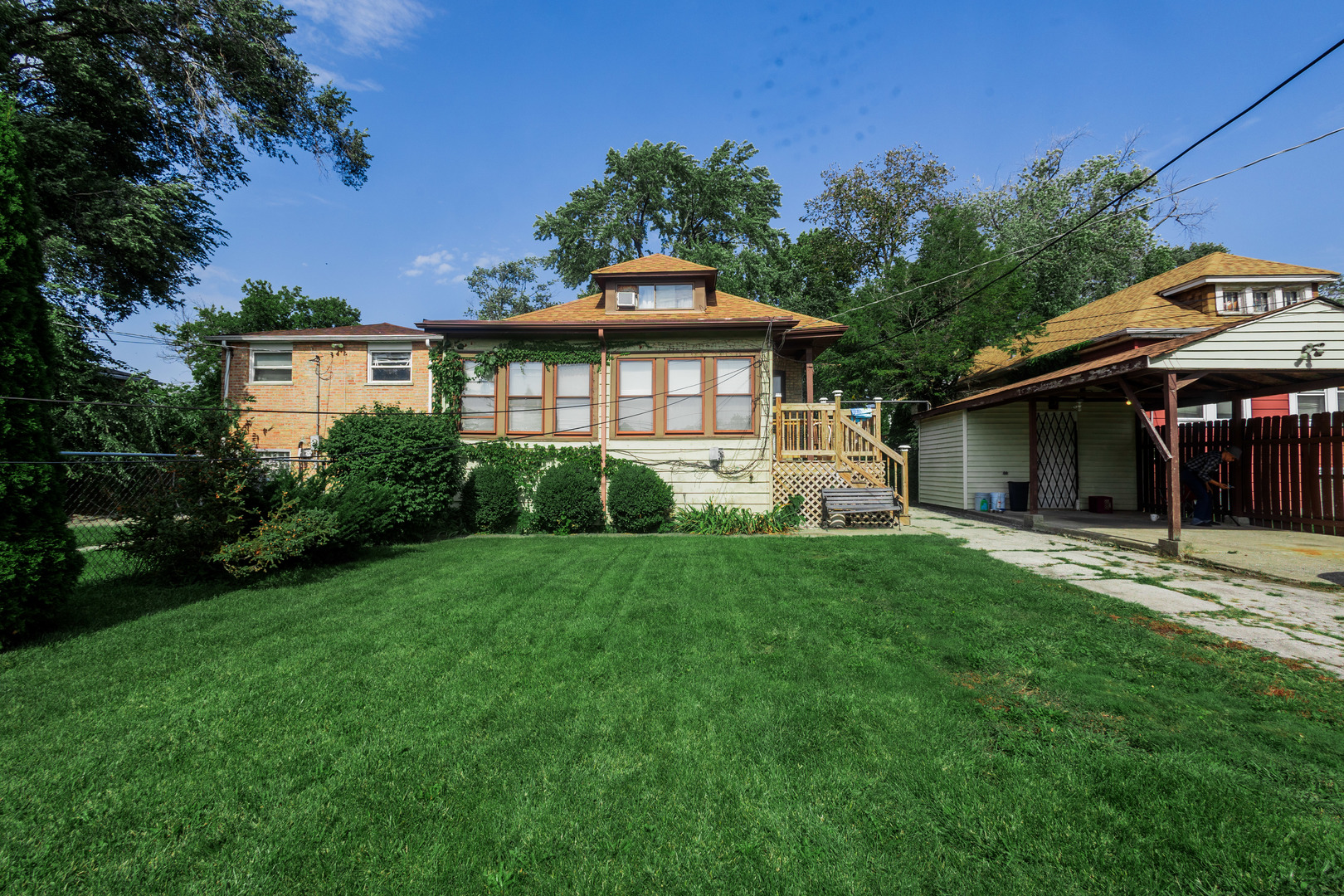 1219 West 96th Street Chicago, IL 60643 - Photo 5 of 13 a front view of a house with a yard