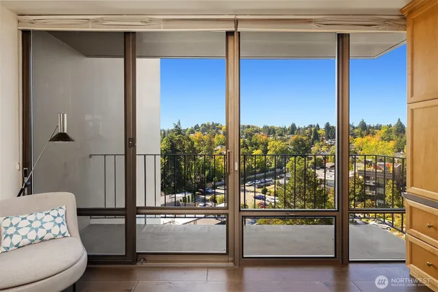 a view of an empty room and glass door