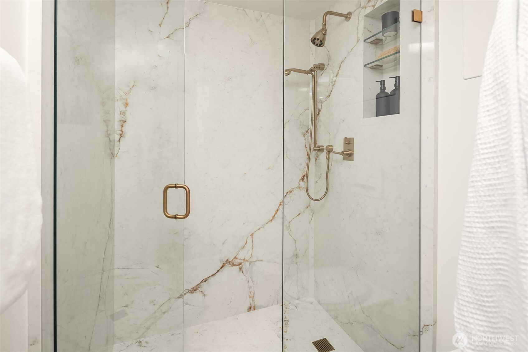 1620 43rd Avenue East, Unit 8C Seattle, WA 98112 - Photo 21 of 27 a bathroom with a shower