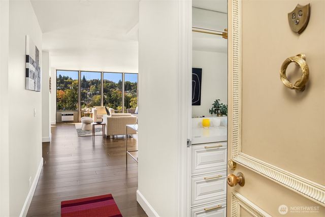 a view of living room with furniture and window