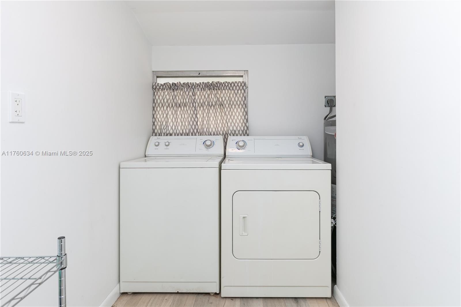 128 Southwest 5th Street Hallandale Beach, FL 33009 - Photo 14 of 17 a utility room with dryer and washer