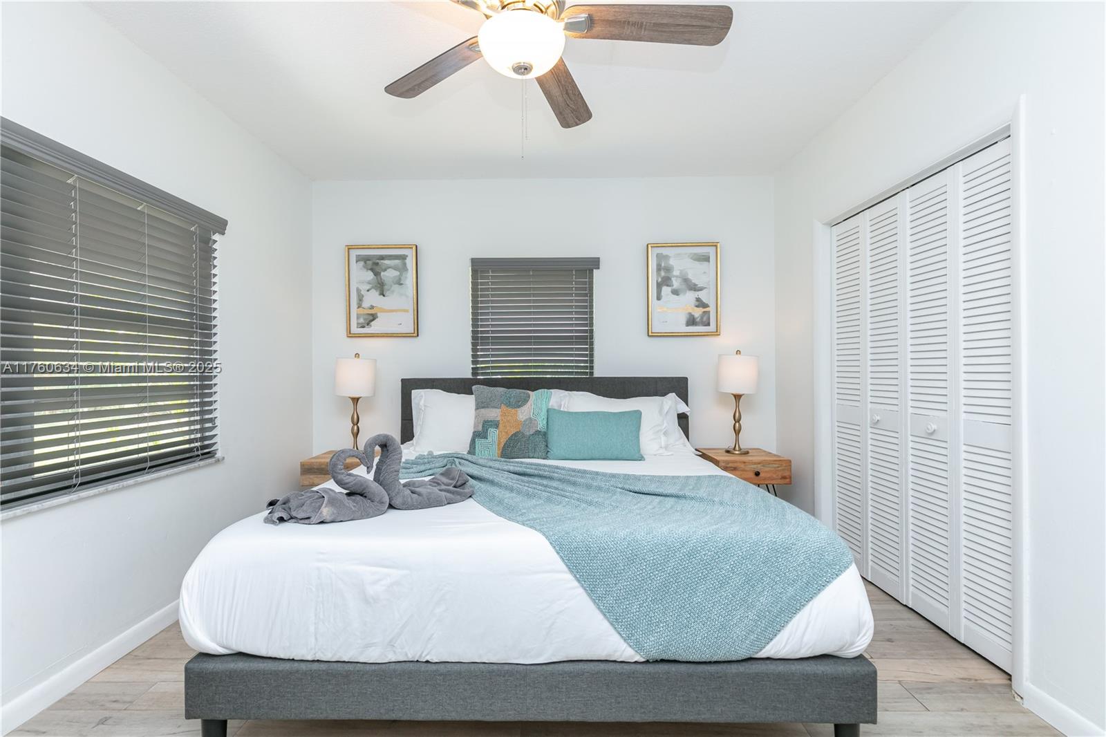 128 Southwest 5th Street Hallandale Beach, FL 33009 - Photo 15 of 17 a bedroom with a bed and window