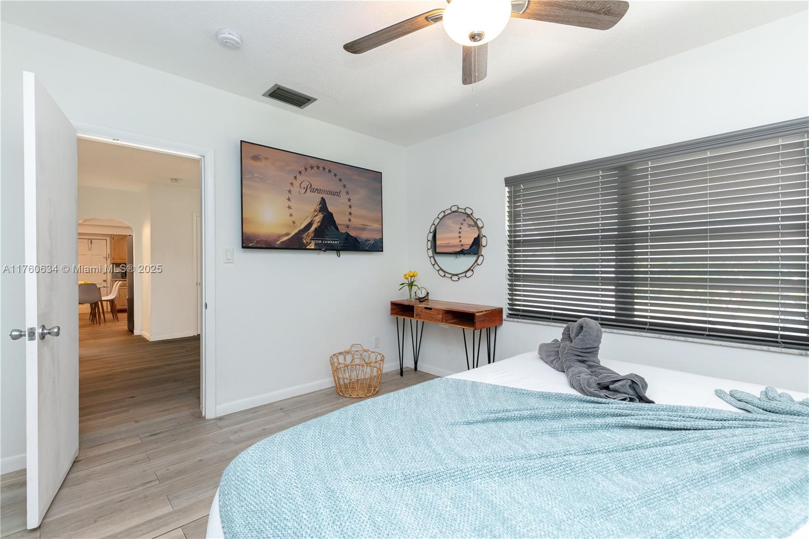 128 Southwest 5th Street Hallandale Beach, FL 33009 - Photo 16 of 17 a bedroom with furniture and a window