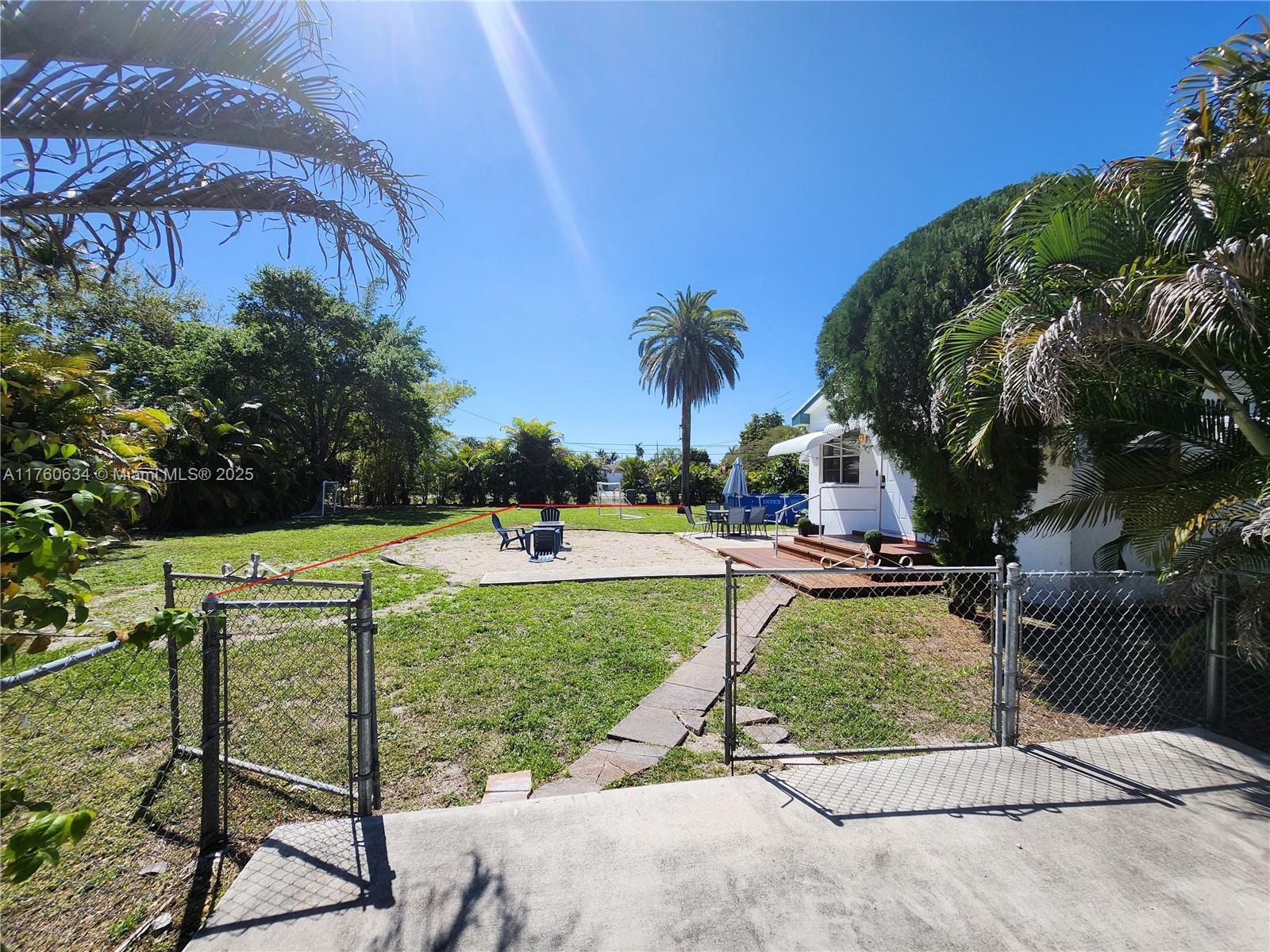 128 Southwest 5th Street Hallandale Beach, FL 33009 - Photo 2 of 17 a view of a backyard