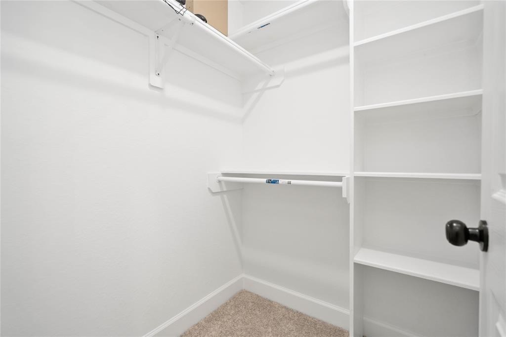 205 Bolden Street, Unit B Houston, TX 77029 - Photo 9 of 15 a view of an empty walk in closet