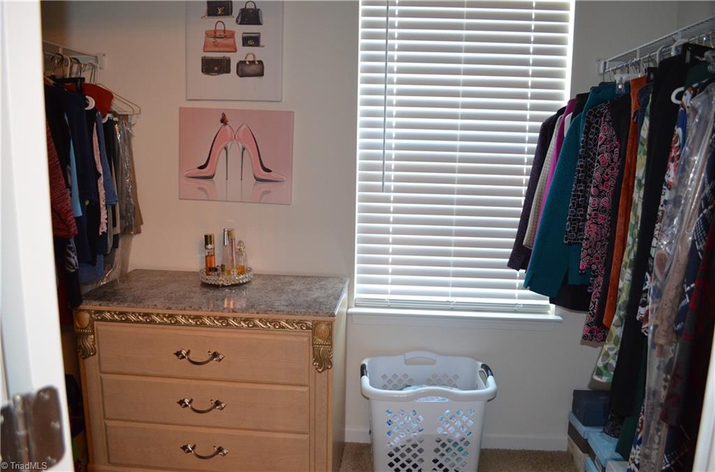4688 Heatherly Road Winston-Salem, NC 27105 - Photo 15 of 17 Walk in closet in primary bedroom.
