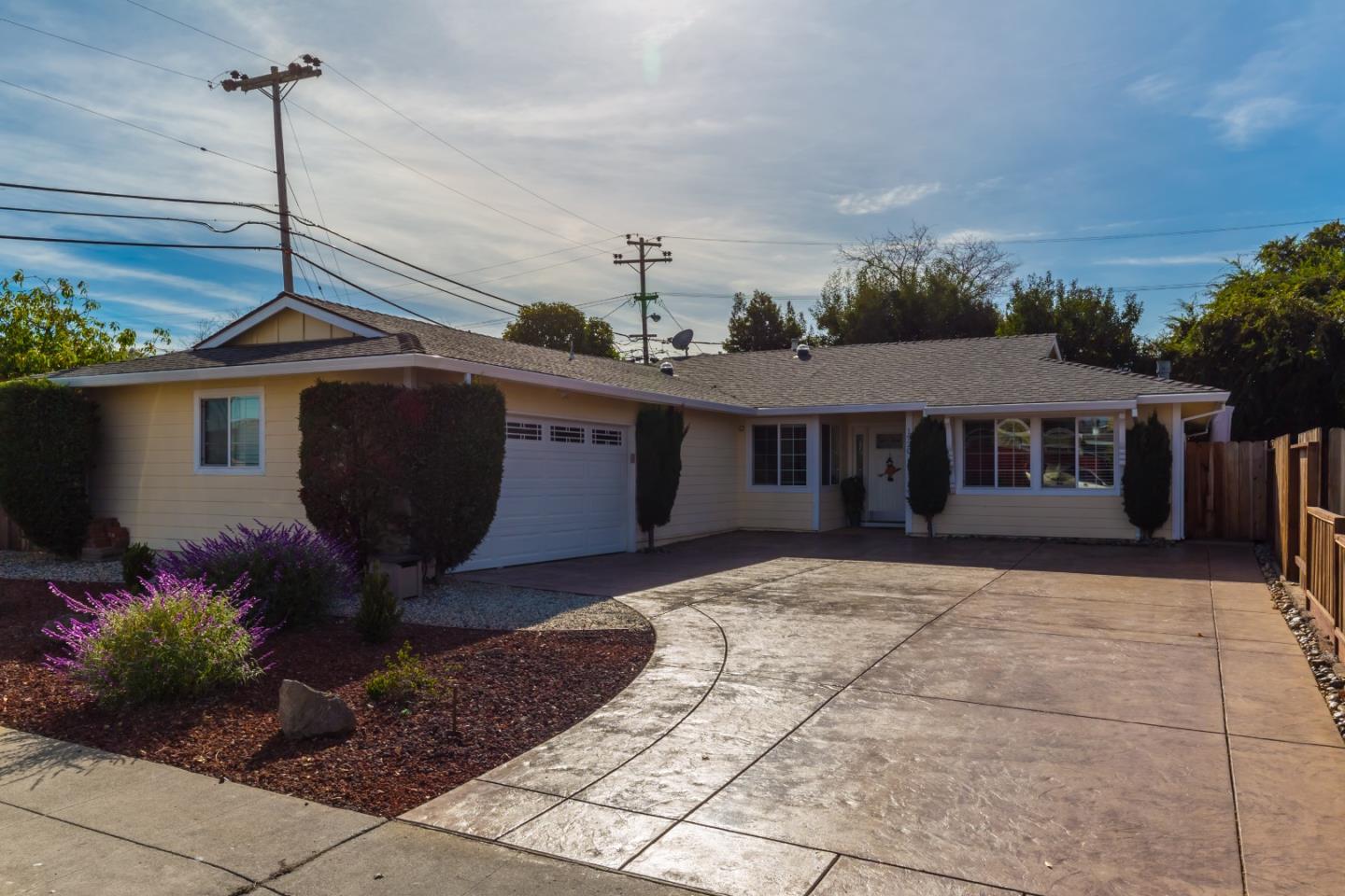 1920 Playa Street San Mateo, CA 94403 - Photo 2 of 43 a front view of a house with garden