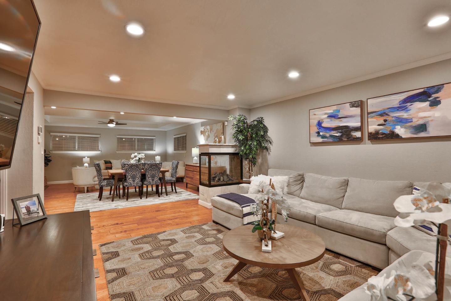 1920 Playa Street San Mateo, CA 94403 - Photo 11 of 43 a living room with furniture and a dining table with kitchen view