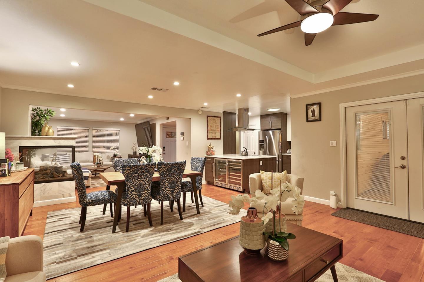 1920 Playa Street San Mateo, CA 94403 - Photo 16 of 43 a view of a dining room and livingroom with furniture wooden floor a chandelier