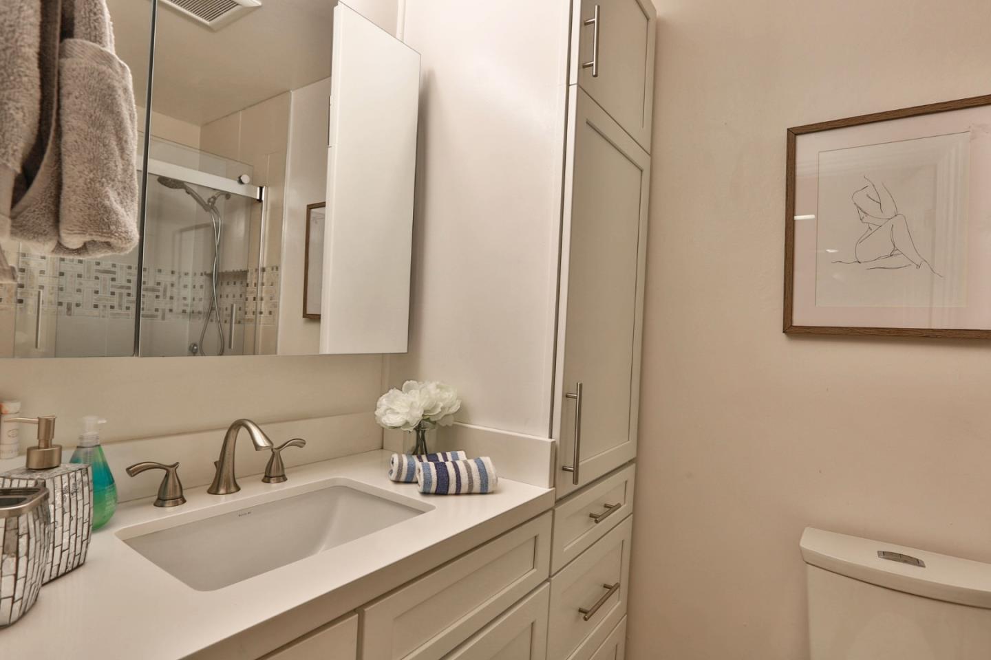 1920 Playa Street San Mateo, CA 94403 - Photo 33 of 43 a bathroom with a sink and a mirror