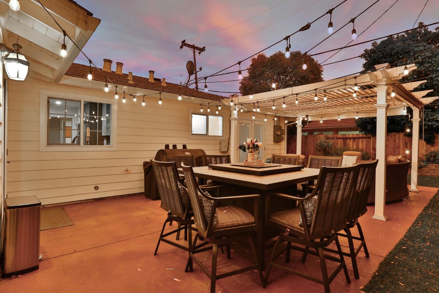 1920 Playa Street San Mateo, CA 94403 - Photo 36 of 43 a view of a dining table and chairs in a patio