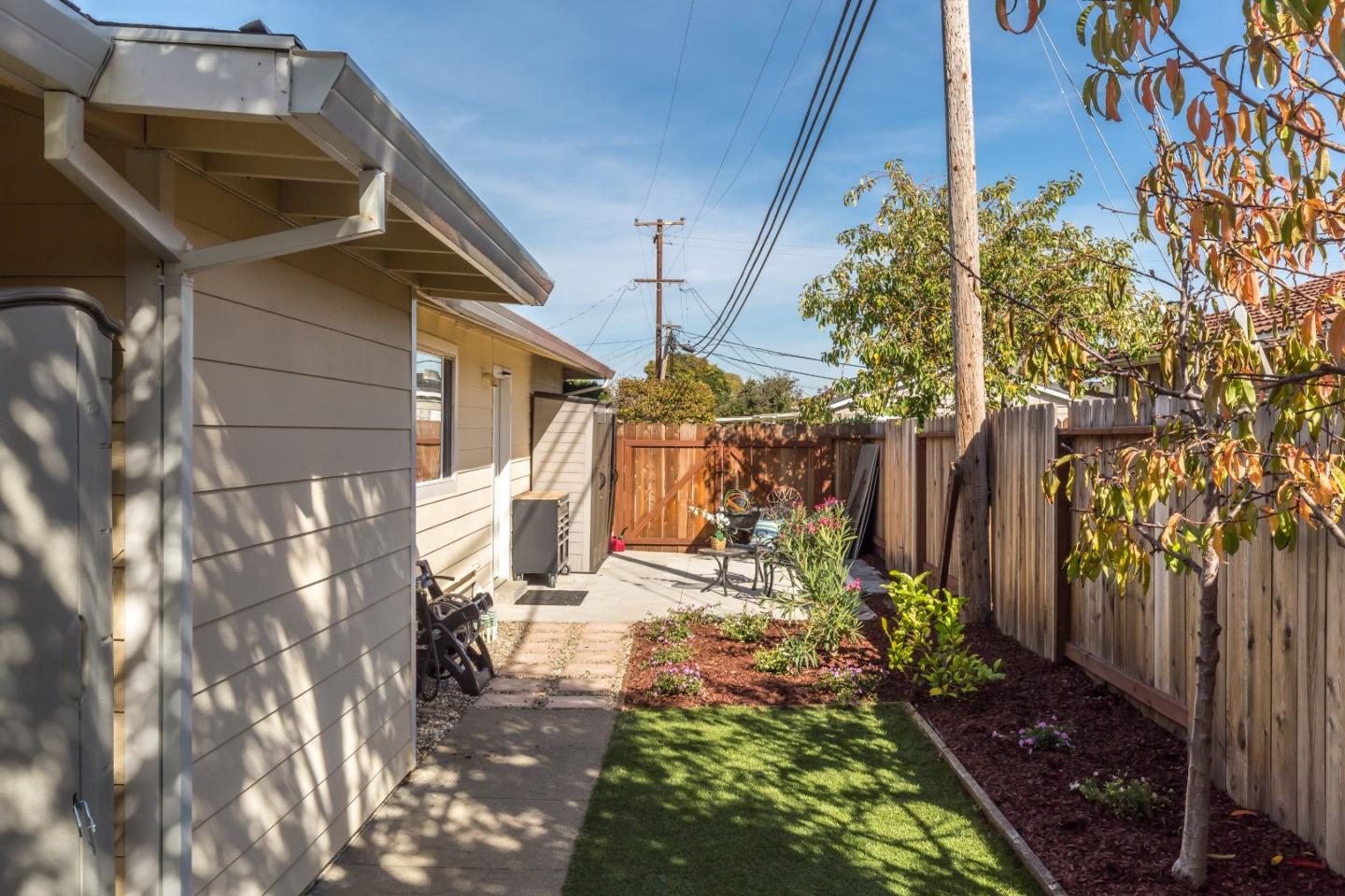 1920 Playa Street San Mateo, CA 94403 - Photo 38 of 43 a view of a house with a yard