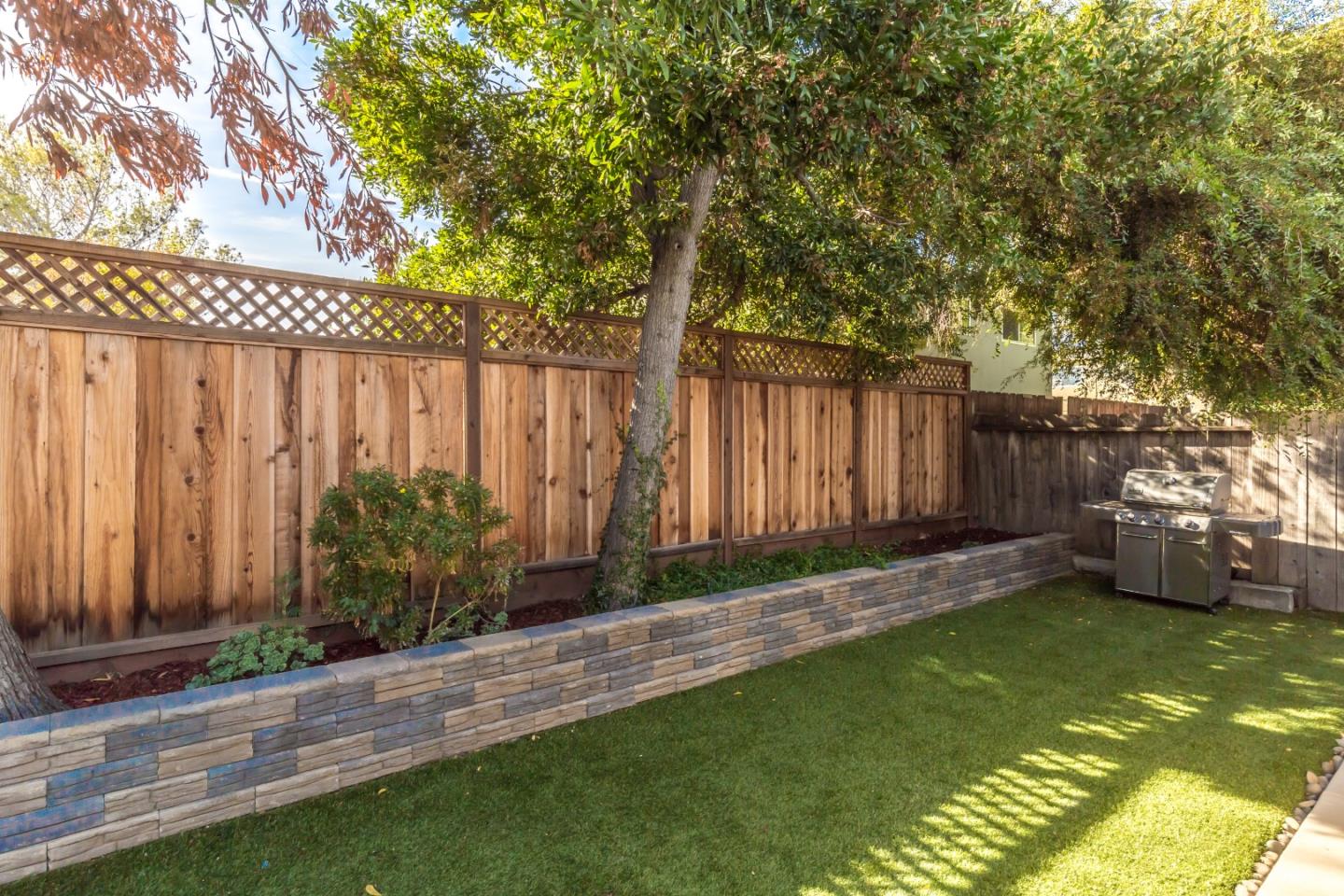 1920 Playa Street San Mateo, CA 94403 - Photo 42 of 43 a backyard of a house with lots of green space
