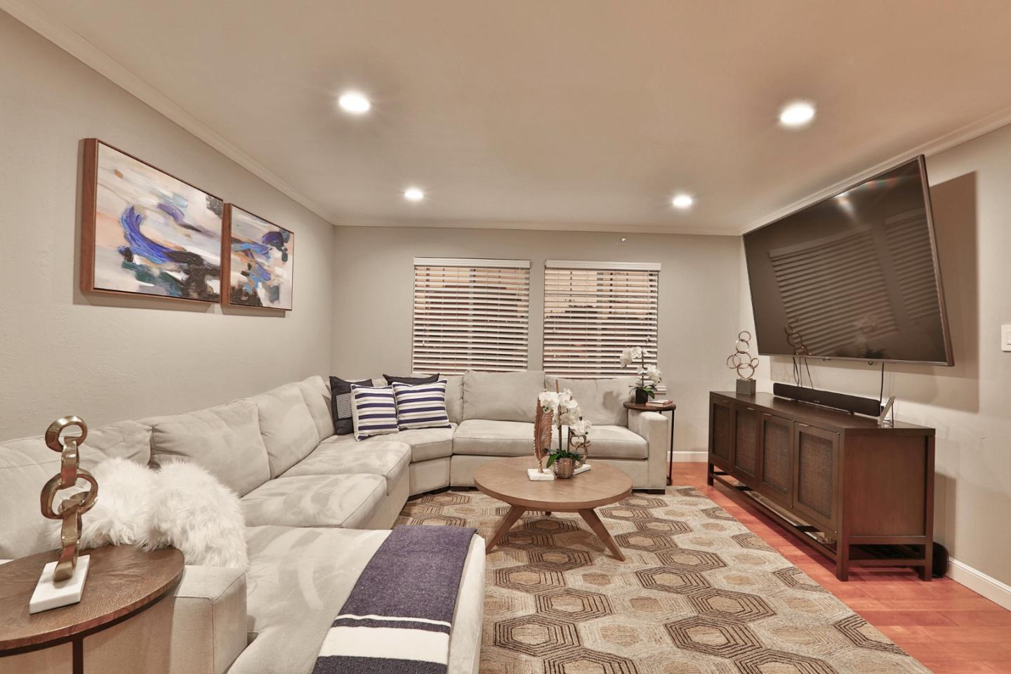 1920 Playa Street San Mateo, CA 94403 - Photo 9 of 43 a living room with furniture and a flat screen tv