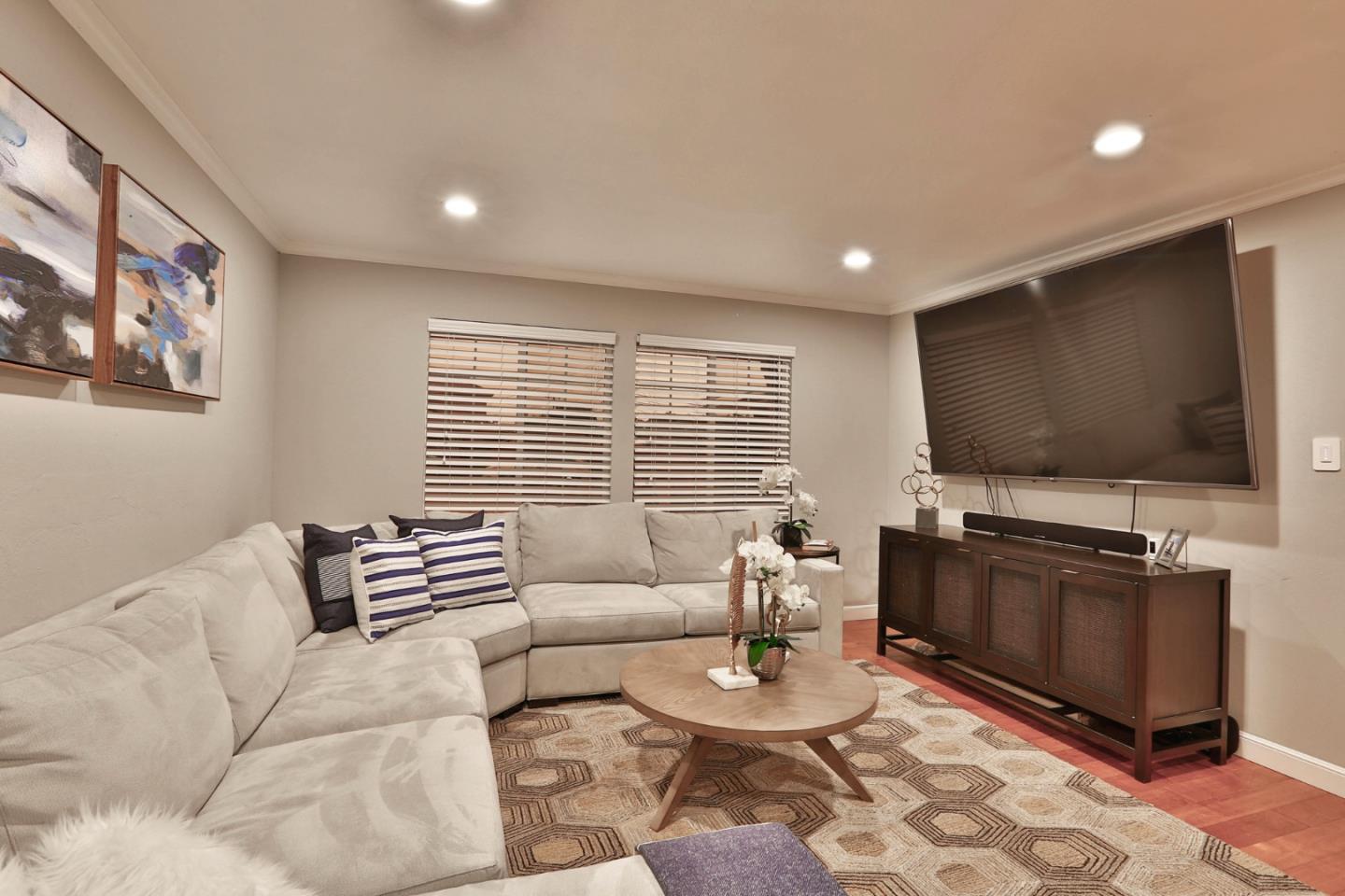 1920 Playa Street San Mateo, CA 94403 - Photo 10 of 43 a living room with furniture and a flat screen tv