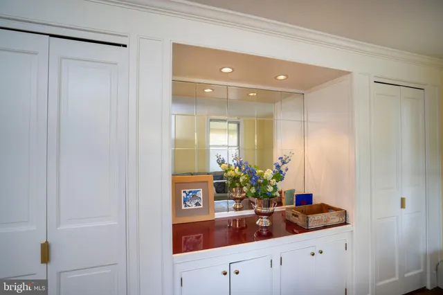 a kitchen that has a sink cabinets counter space and stainless steel appliances
