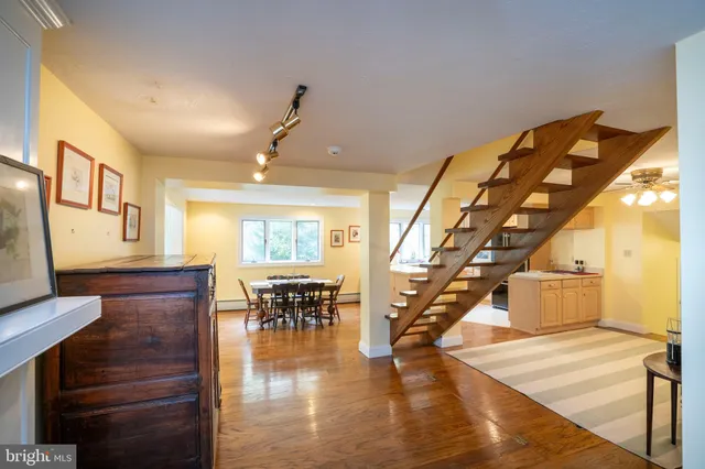 a kitchen with a sink stove and refrigerator
