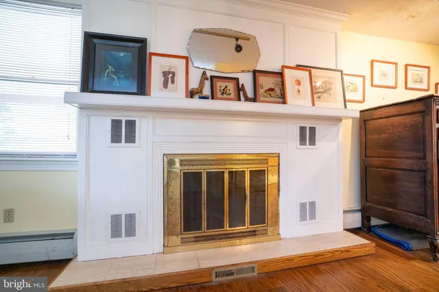 a view of a dining room with furniture and window