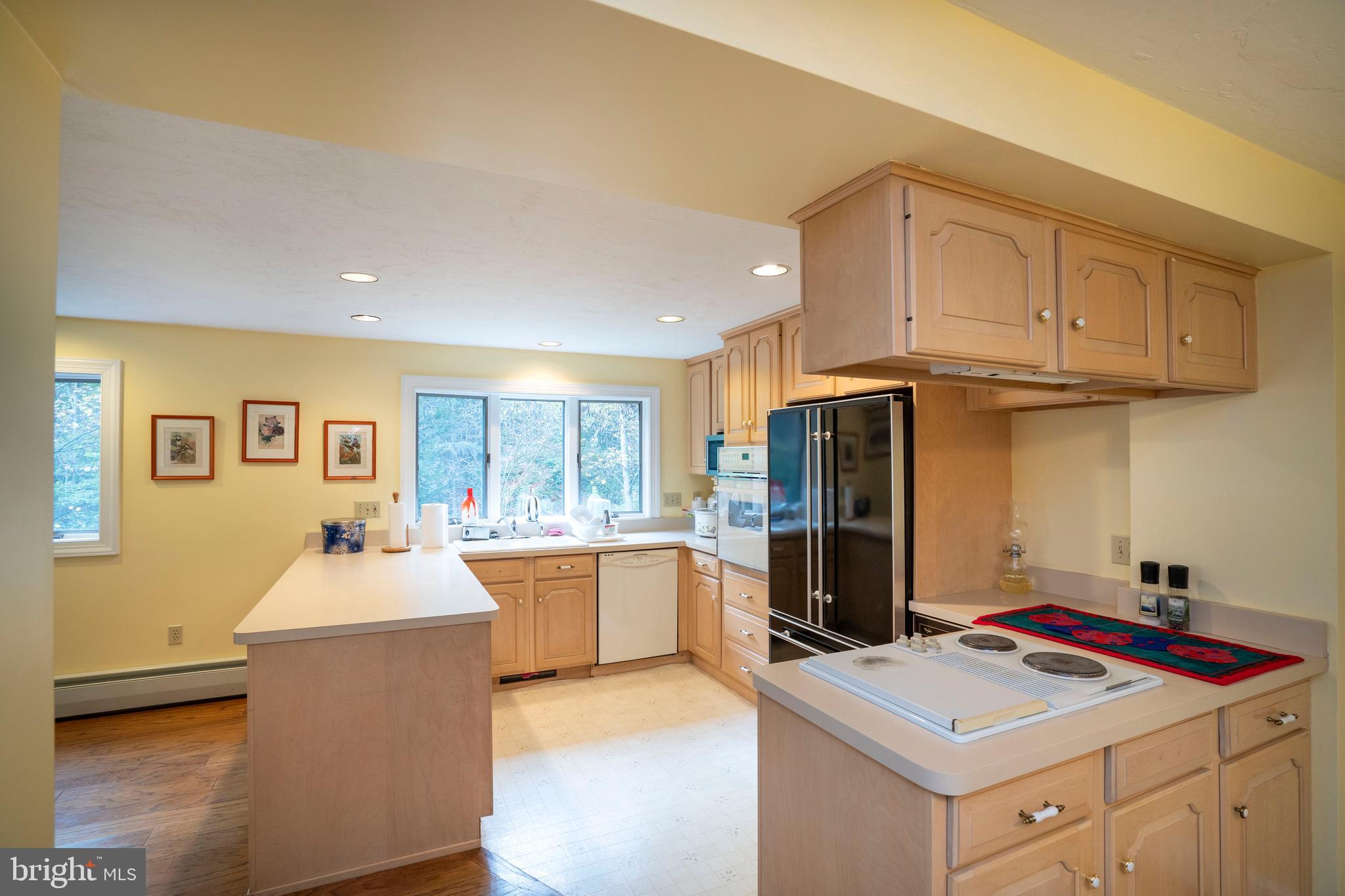 9980 Douglas Road Red Lion, PA 17356 - Photo 21 of 64 a kitchen that has a sink cabinets counter space and stainless steel appliances