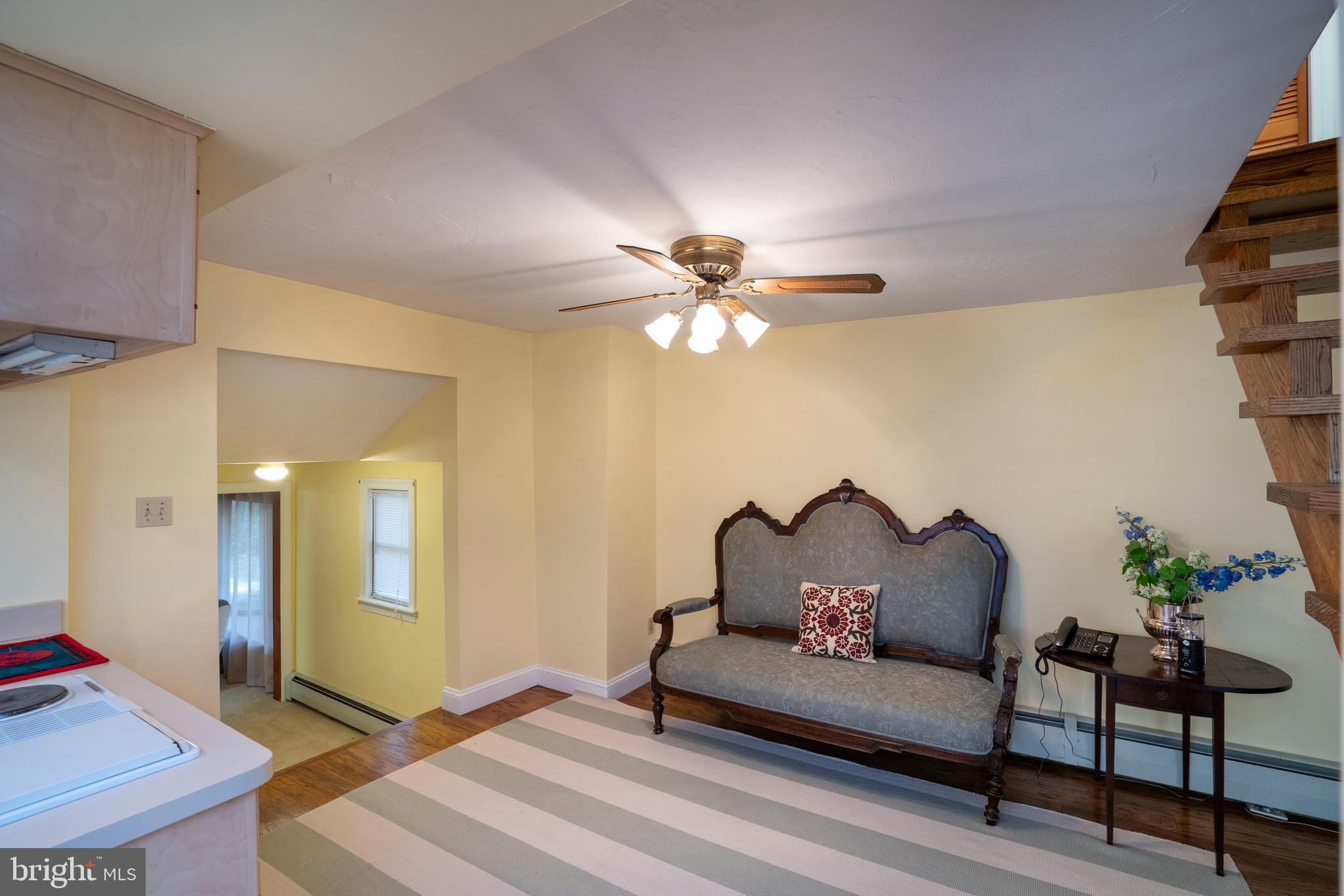 9980 Douglas Road Red Lion, PA 17356 - Photo 29 of 64 a living room with furniture and a chandelier