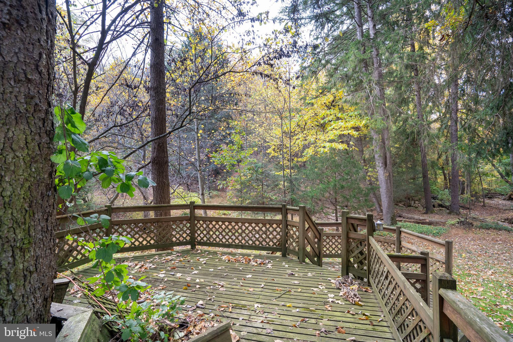 9980 Douglas Road Red Lion, PA 17356 - Photo 35 of 64 a view of a roof deck with table and chairs and potted plants
