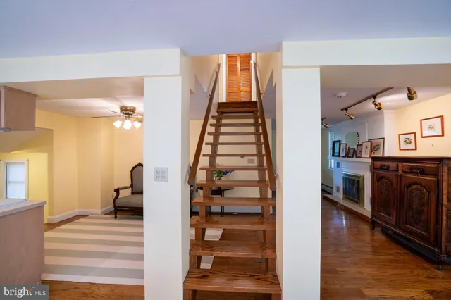 a bedroom with a bed and a walk in closet