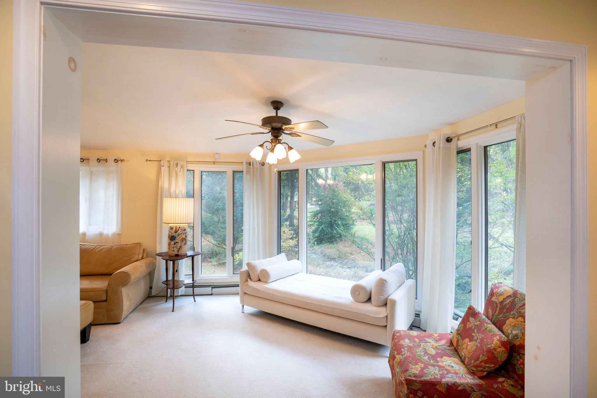 9980 Douglas Road Red Lion, PA 17356 - Photo 4 of 64 a living room with furniture and a large window with outer view