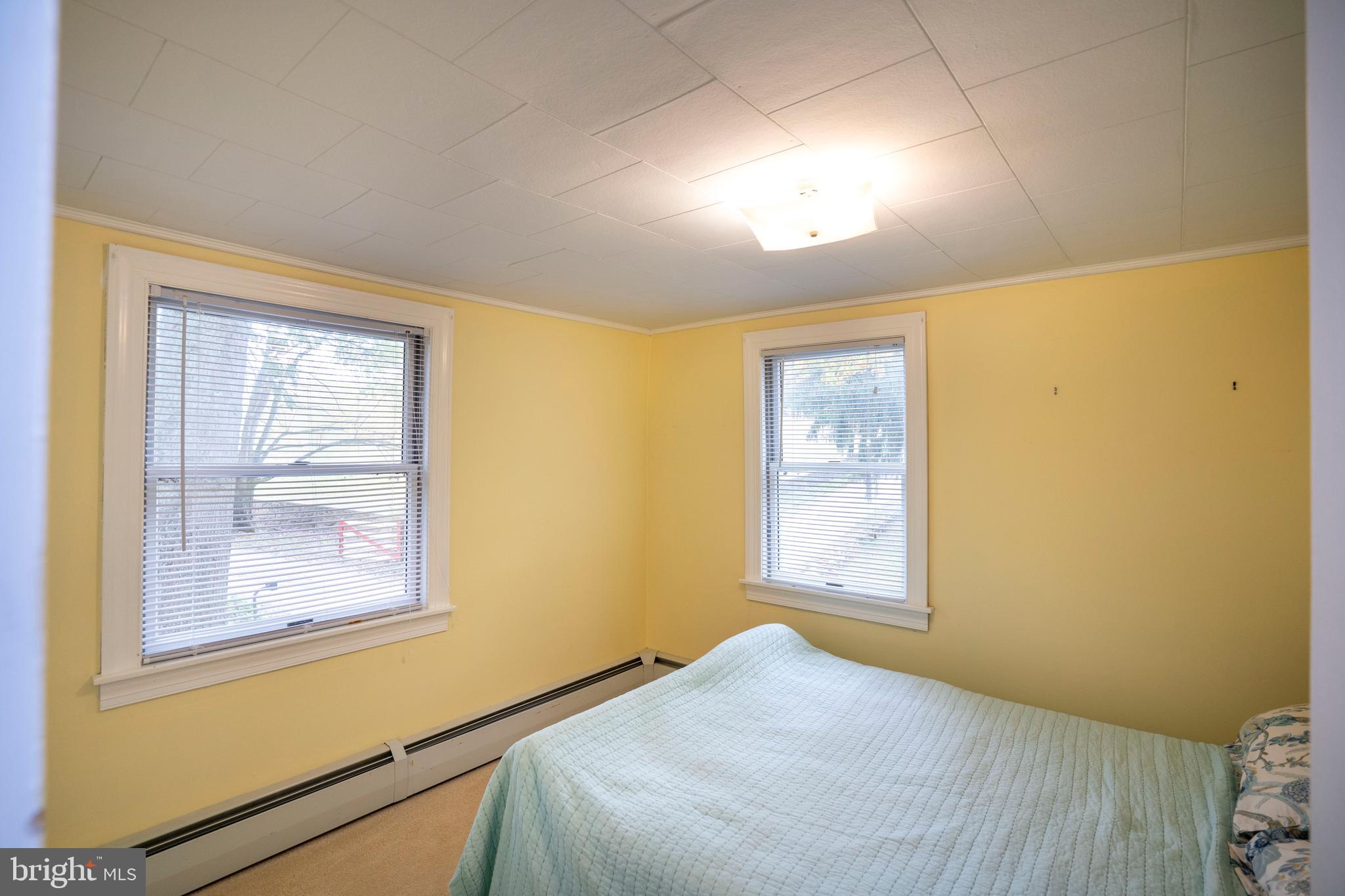 9980 Douglas Road Red Lion, PA 17356 - Photo 45 of 64 a bedroom with a bed and a window