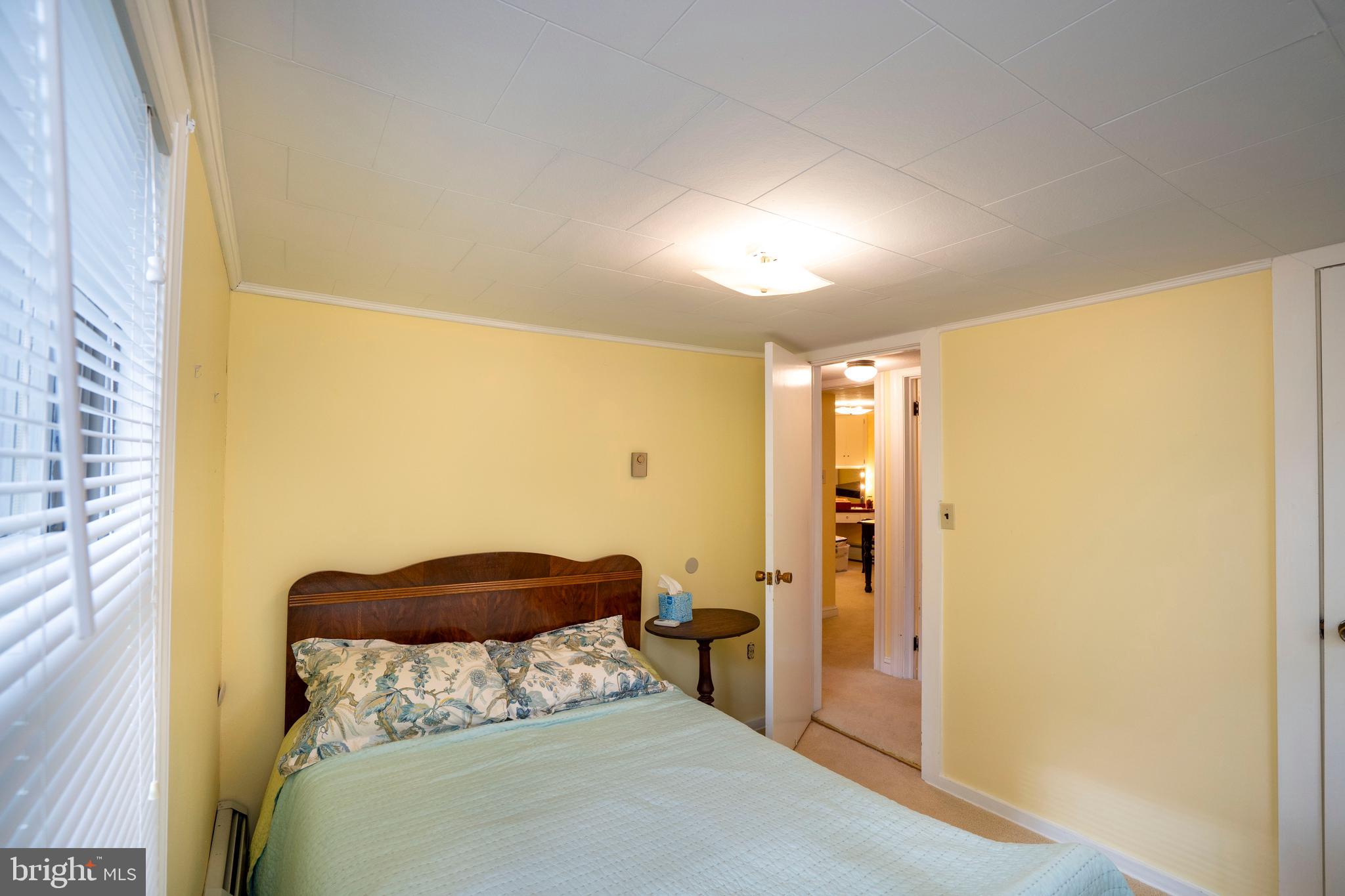 9980 Douglas Road Red Lion, PA 17356 - Photo 46 of 64 a bedroom with a bed and a walk in closet