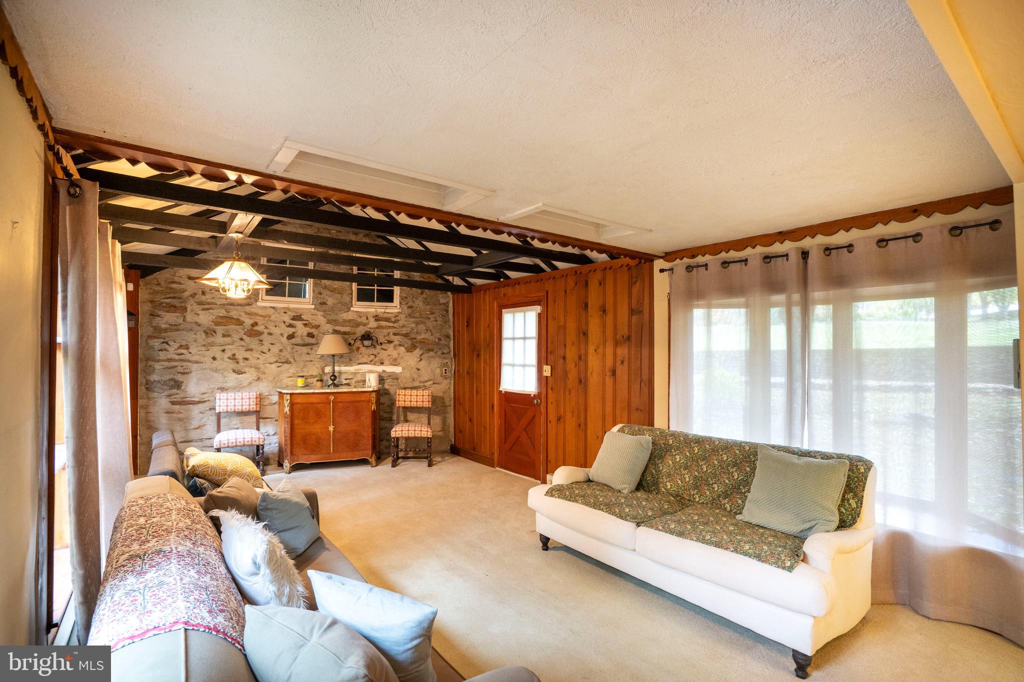 9980 Douglas Road Red Lion, PA 17356 - Photo 7 of 64 a living room with furniture and a flat screen tv